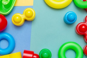 Colorful child kid&rsquo;s education toys pattern background copy space on the bright background. Childhood infancy children babies concept