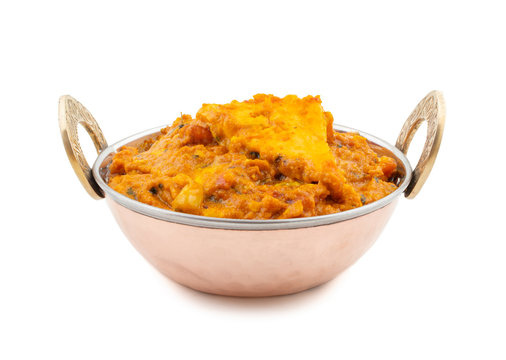 Indian Vegetarian Cuisine Special Sweet And Spicy Paneer Pasanda or Stuffed Paneer Curry, Delicacy Consisting of Stuffed Paneer with Rich Creamy Gravy on White Background