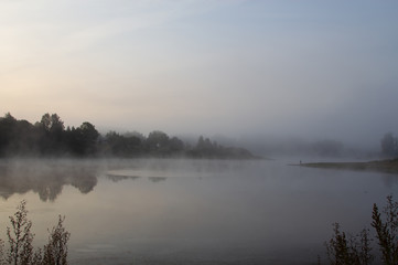 Misty September morning on the river. Dawn on the river.