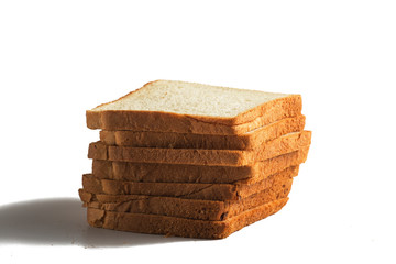 Stack of sliced bread for toast isolated on white