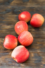 Apples on a wooden table. Autumn harvest