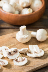 Mushrooms on a wooden table. Rustic style
