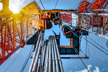 Oil and Gas Drilling Rig. Oil drilling rig operation on the oil platform in oil and gas industry. - obrazy, fototapety, plakaty