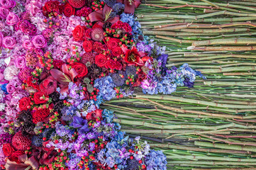 Obraz premium Flowers background. Flower arrangement of roses, carnations and hydrangeas. Flowerbed, top view, copy space. Gretting card, postcard.