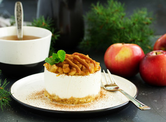 Cheesecake with apples and caramel. New Year's dessert. Selective focus