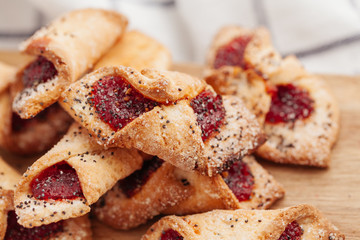 Stack of crunchy tasty cookies on a kitchen table close up