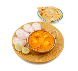 Indian Popular Vegetarian Cuisine Cheese Butter Masala Also Know as Cheese Cottage Curry or Paneer Butter Masala Served With Tandoori Roti on Isolated White Background