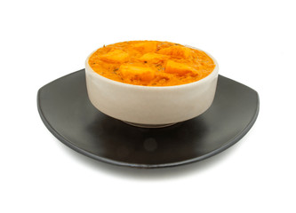 Indian Popular Vegetarian Cuisine Cheese Butter Masala Also Know as Cheese Cottage Curry or Paneer Butter Masala on Isolated White Background