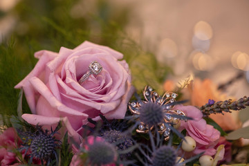 wedding ring in brides bouquet