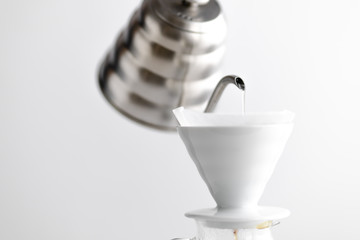 Drip coffee,Drip kettle,Black coffee make a coffee White scene