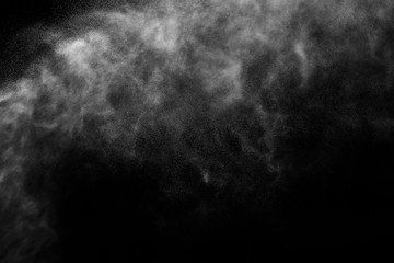 A stream of water and a cloud of drops