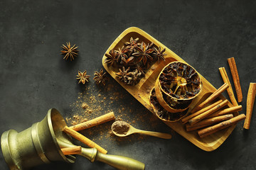 Spices for cooking. Cinnamon and anise. Pestle for spices.