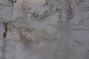 Struttura grungy della parete del cemento nel tono grigio. Priorità bassa e struttura architettoniche astratte per il disegno.