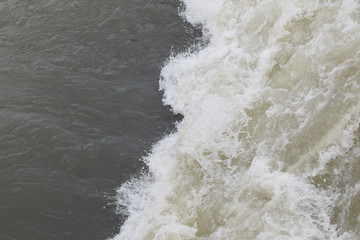 Sea water with white splashes to use as a background