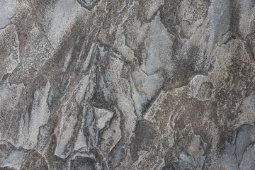 Beautiful old colored sedimentary rock texture closeup
