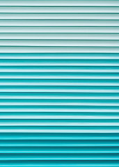 Obraz premium Background of blue plastic drinking straws. Eco and plastic concept. Lined striped backdrop in blue colors.