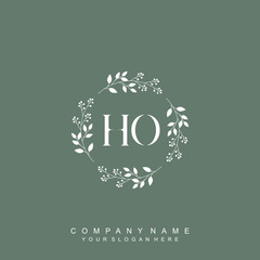 letter HO surrounded by beautiful and elegant flowers and leaves. Wedding monogram logo template. Fashion Logo template Vectors,