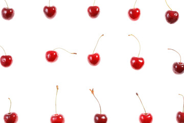 Fresh cherries on white background. Juicy summer berry close-up.