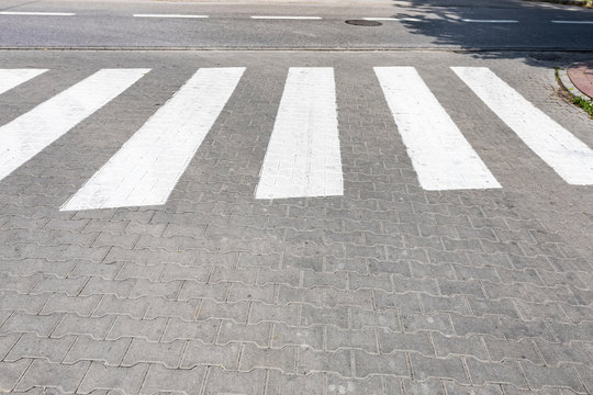 Pedestrian crossing. Marking the road with stripes