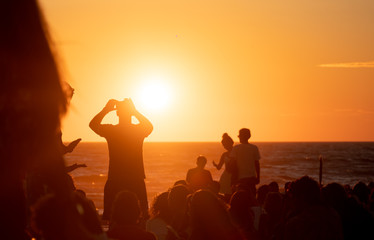 Taking sunset photos on the beach
