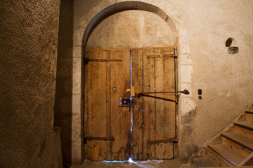 Old wooden church door, medieval building