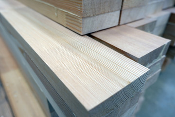 Glued pine timber beams for wooden windows closeup view
