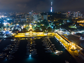Night lights of Sea Port of Sochi, Krasnodar Krai, Russia. Aerial view.