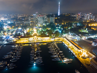 Night lights of Sea Port of Sochi, Krasnodar Krai, Russia. Aerial view.