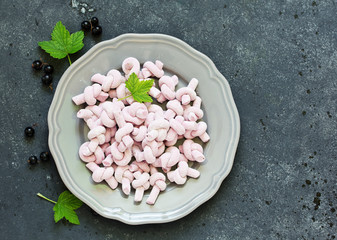 Homemade blackcurrant marshmallows. selective focus .. Dessert.