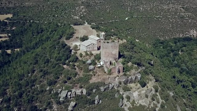 .Aerial view of the Riner castle, church and tower near Solsona, Catalonia, Spain, Europe.
Clockwise orbit