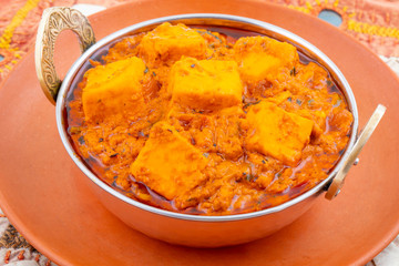 Indian Delicious Spicy Vegetarian Cuisine Paneer Toofani Also Know as Paneer Tufani, Toofani Paneer Masala or Dhaba Style Paneer Masala on isolated White Background
