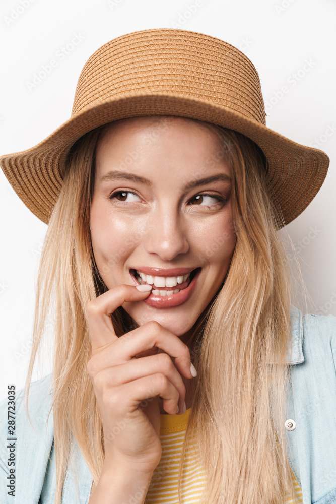 Sticker dreaming thinking flirty amazing young pretty woman wearing hat posing isolated over white wall back