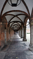 Obraz premium Old brick tunnel with lanterns, Market Square, Lubeck, Germany