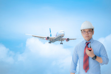 Flight control engineer With the plane in the background