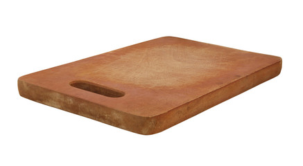 Used rustic wooden chopping board isolated on white