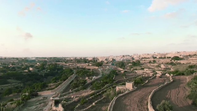 aerial shot towards the Zurrieq Village, Malta, drone approaching the village