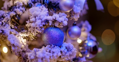 Christmas tree decoration with light in blue color at night