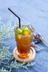 Iced peach tea quenches the heat with refreshing beverages.