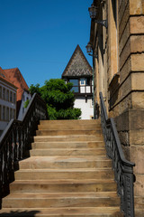 Fototapeta na wymiar stairs, wall and half timbered house in Osnabruck, Germany