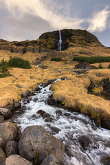 Waterfall of Bjarnarfoss in Iceland