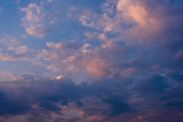 Naklejka na ściany i meble Multicolor Dramatic sky with dark clouds formations, sunset scene