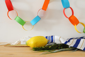 Jewish festival of Sukkot. Traditional symbols (The four species): Etrog, lulav, hadas, arava