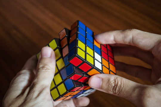 Bangkok, Thailand - June 10, 2019 : People Solving Rubik's Cube