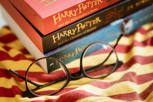 Bangkok, Thailand - July 16, 2019 : Harry Potter books with round shape eyeglasses.