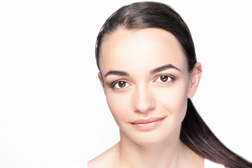 Fototapeta premium Beauty woman portrait with long dark hair and clean skin on white background