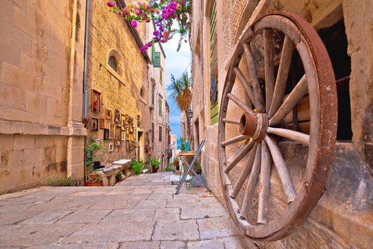 Fototapeta Town of Korcula steep narrow stone street colorful view