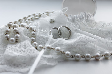 Lace wedding rings with pearl beads. Wedding marriage