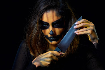 portrait of a woman dressed as halloween pumpkin