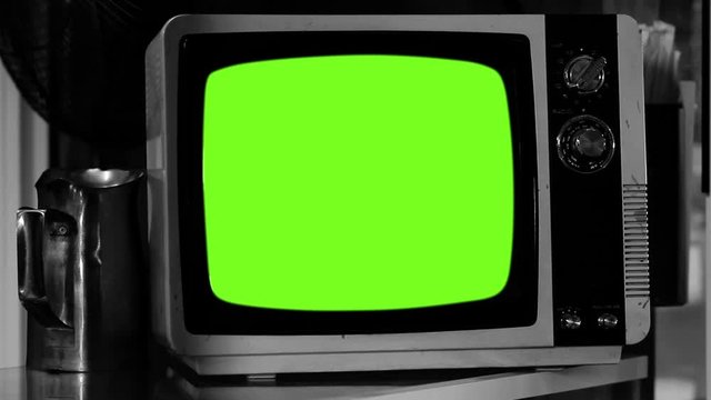 Retro TV Set with Green Screen. Night Tone. Zoom In. You can Replace Green Screen with the Footage or Picture you Want with “Keying” effect in After Effects (check out tutorials on YouTube).  