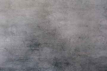 Background of a gray stucco coated and painted exterior, rough cast of cement and concrete wall...